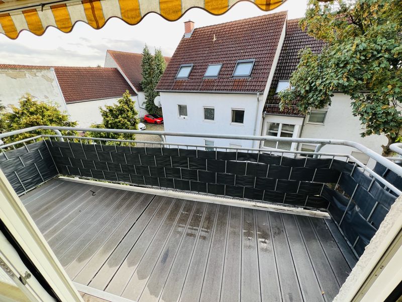 Außergewöhnliche Maisonette-Wohnung mit Balkon, 2 Tageslichtbädern & PKW-Stellplatz